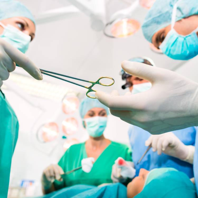 Doctor And Nurses In Operation Room